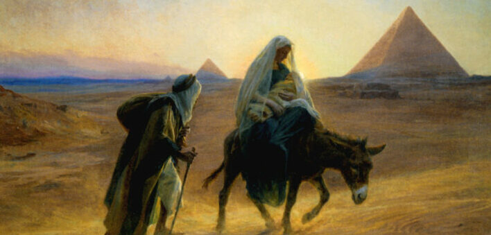 Joseph and Mary walking in front of pyramid in Egypt