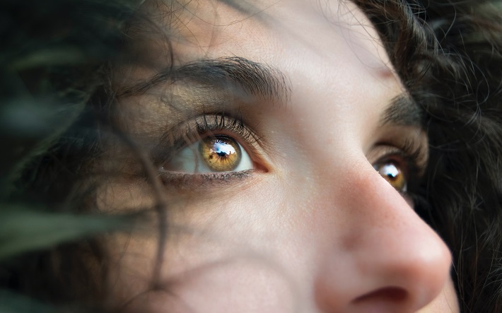 woman looking skyward