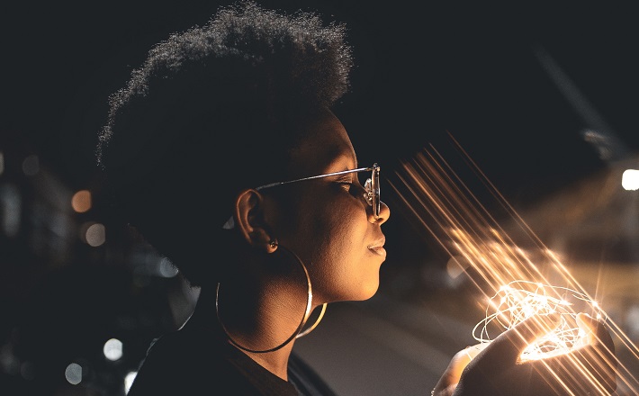 Woman holding lights