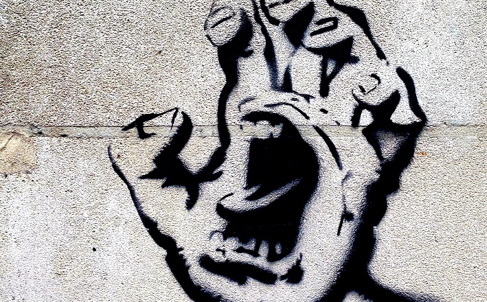 Street art of angry hand cartoon figure