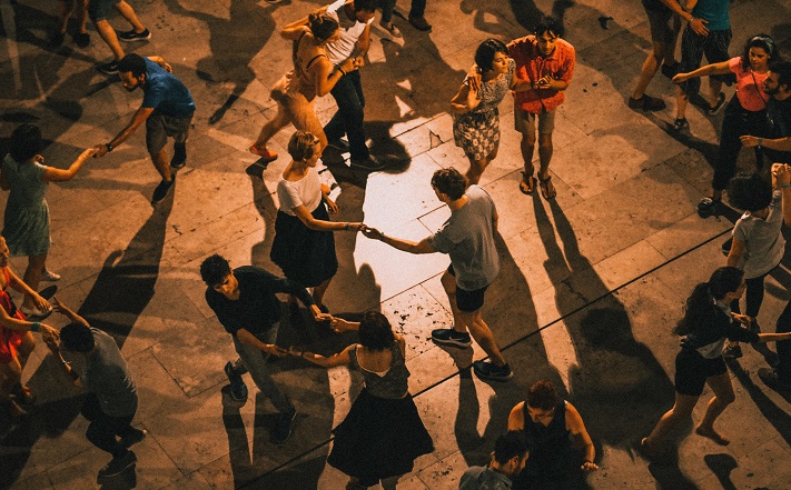 Group dancing at dusk