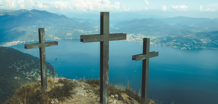 Three crosses overlooking lake