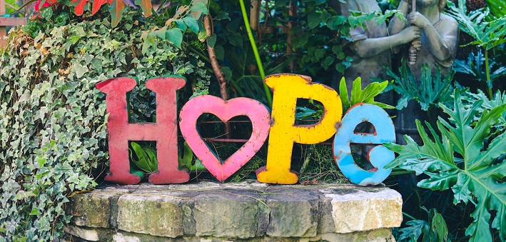 Colorful Hope sign in garden