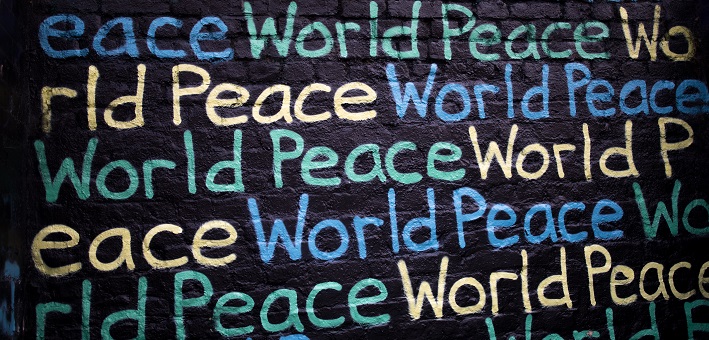 Mural with words World Peace repeated in various colors