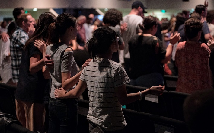 Worshipers joined in singing