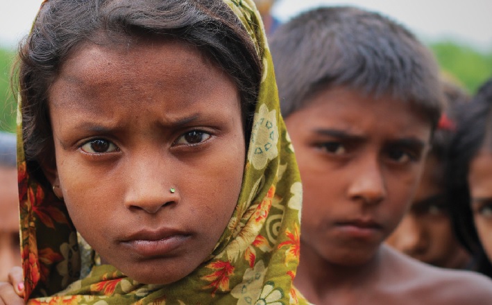 young girl looking imploringly