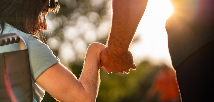 Couple hands during sunset