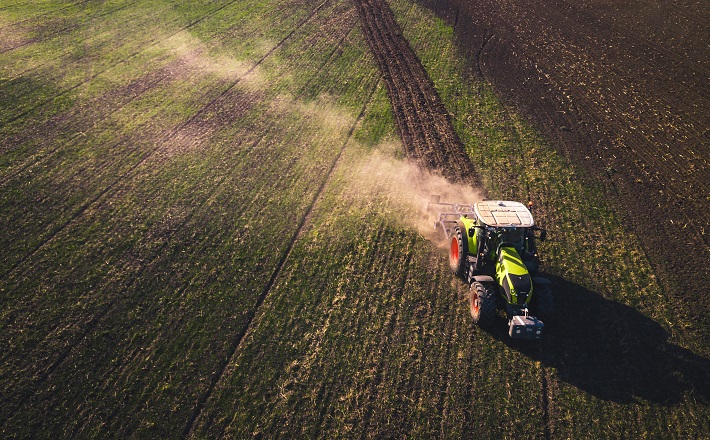 Tractor tilling field