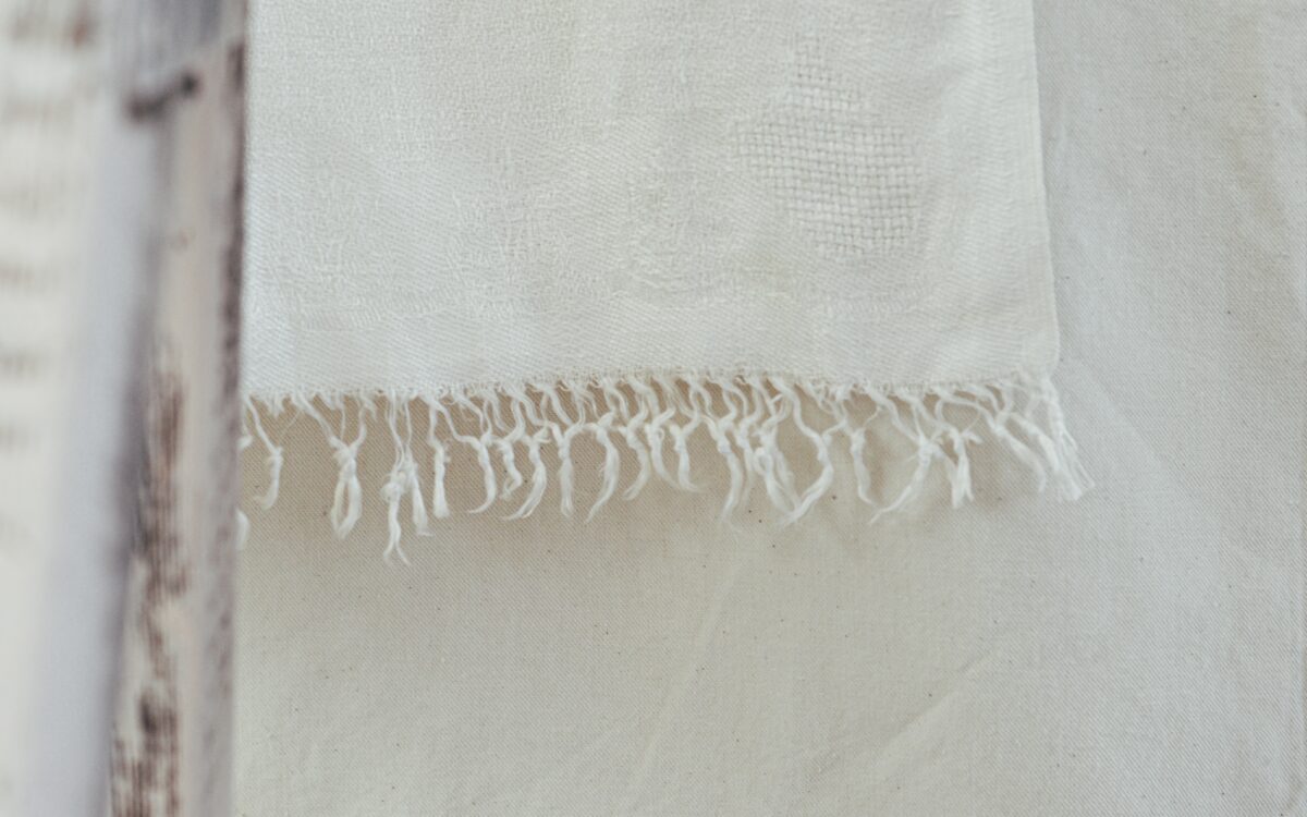 white cloth with fringe