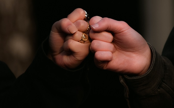 fist bump between two friends