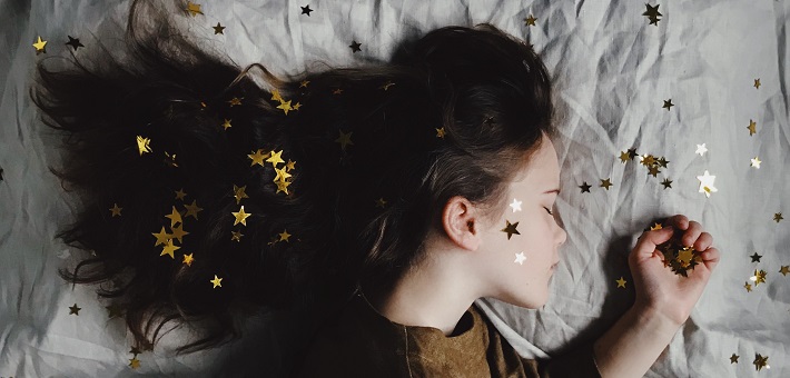 Girl asleep with stars in her hair