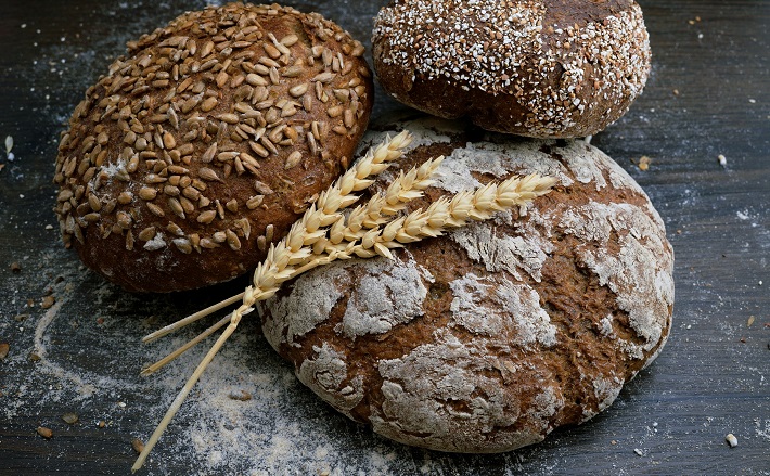 Loaves of bread and wheat stalks