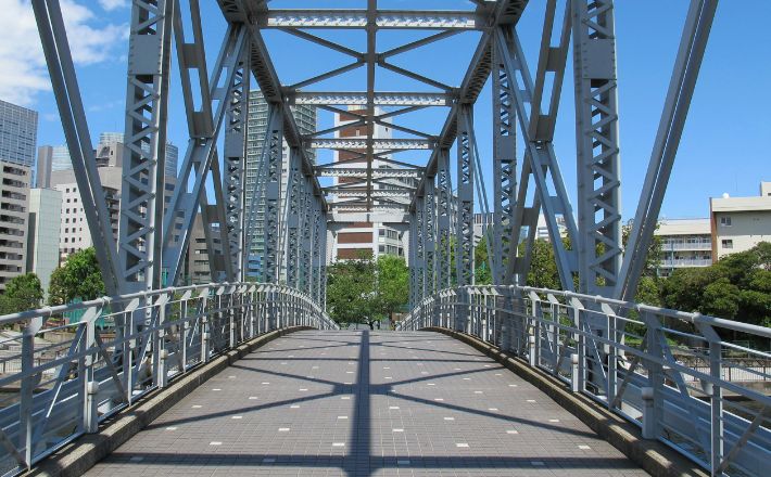 bridge crossing cityscape