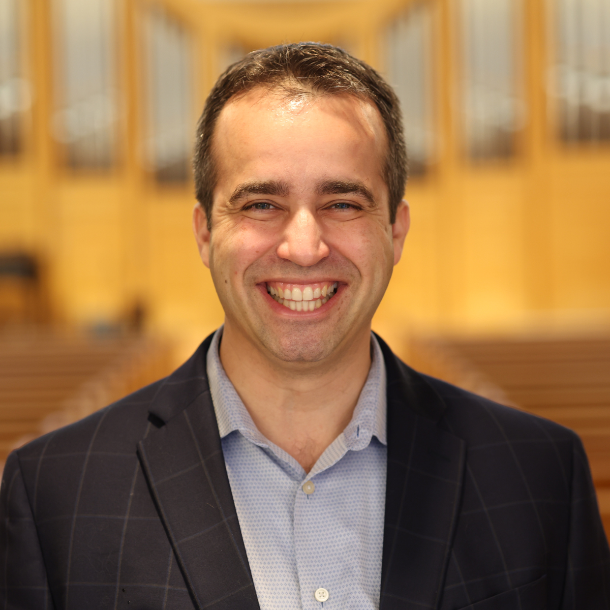 Headshot of Jared E. Alcántara