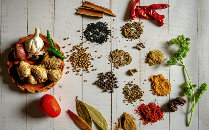 Spices arrayed on a white table