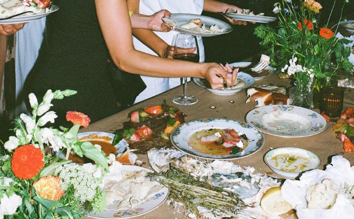 People helping themselves to food at a banquet