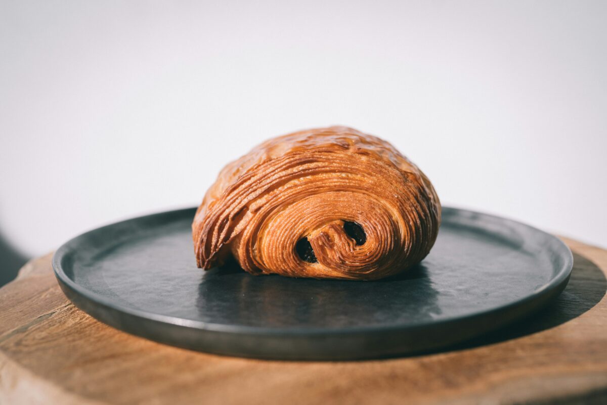 Croissant on a black plate