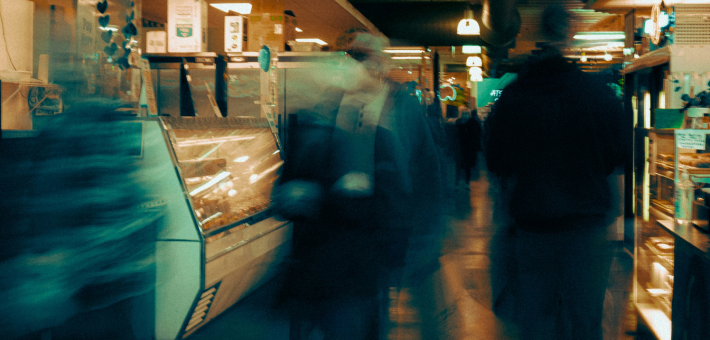 blurry photo of people rushing