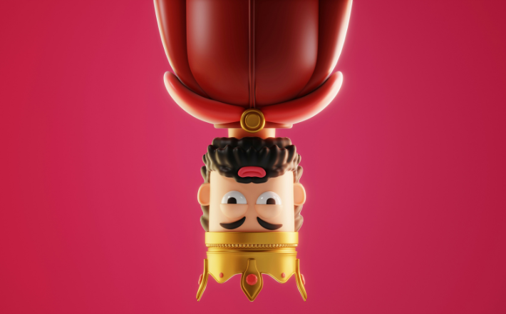 An upside down lego figurine of a man wearing a crown.