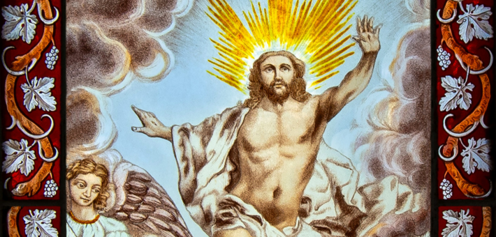 photo of a stained glass window depicting Christ's ascension