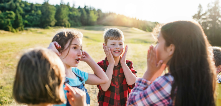 photo of children calling to one another