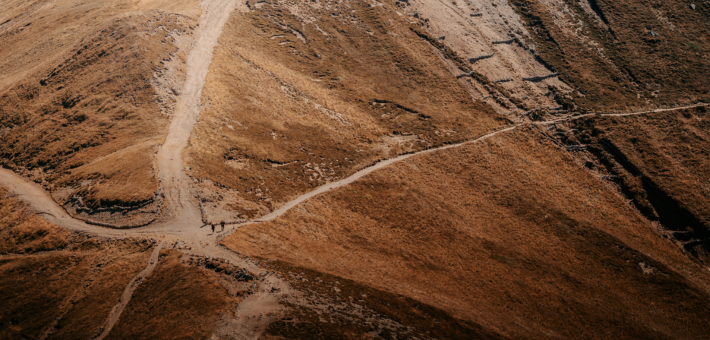 photo of a fork in a mountain path