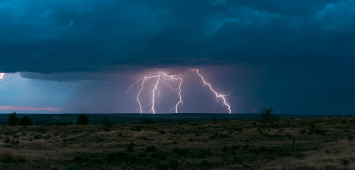 photo of lightning in a field
