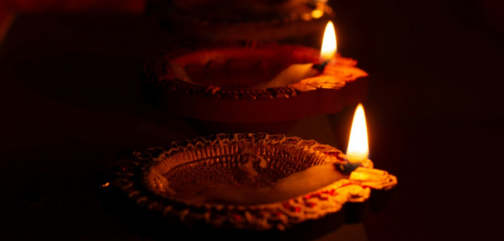 photo of oil lamps lit in the dark